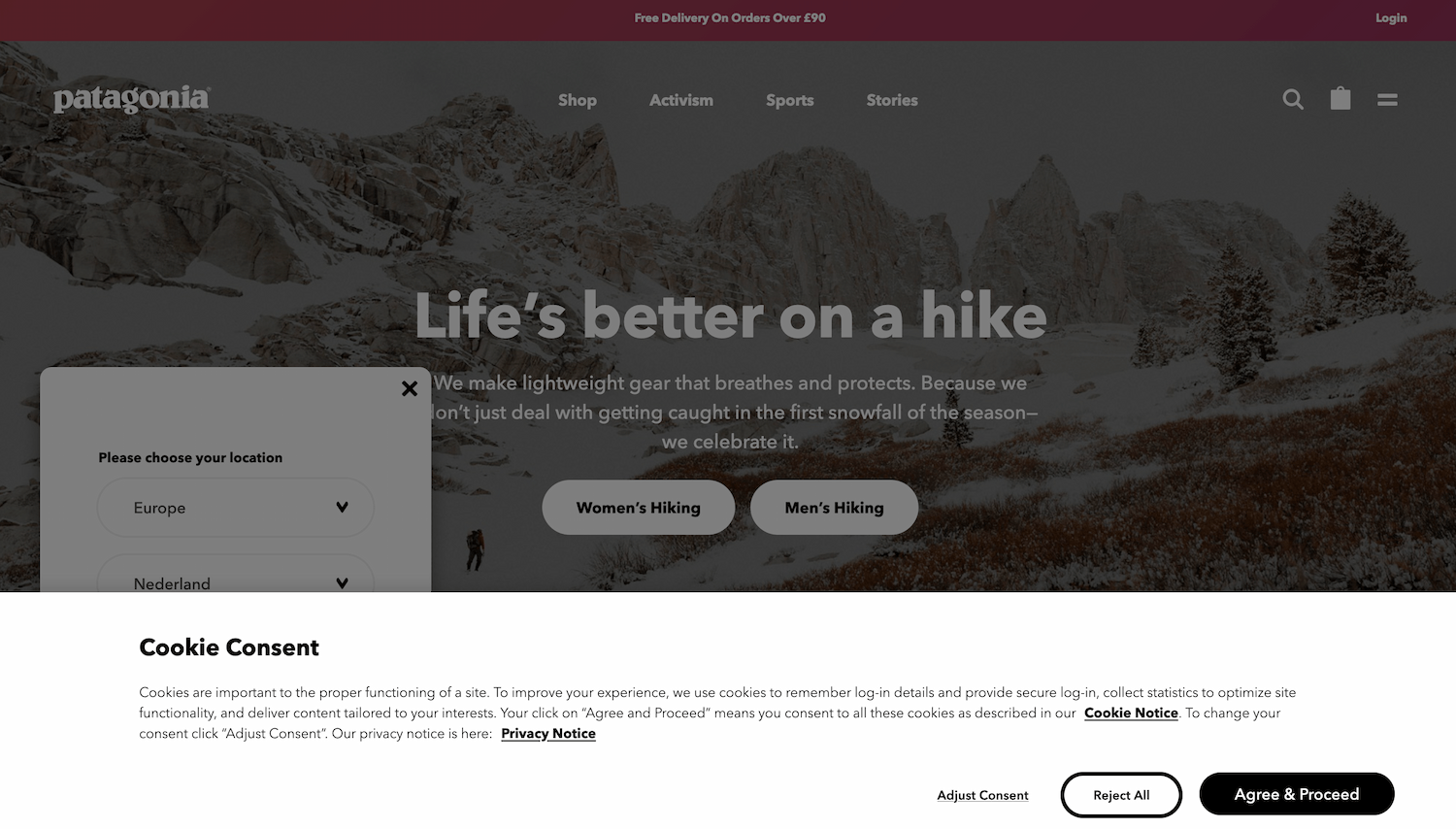 patagonia homepage that is dimmed with a not dimmed cookie consent form laying on the top, with choice between accept all cookies and cookie settings